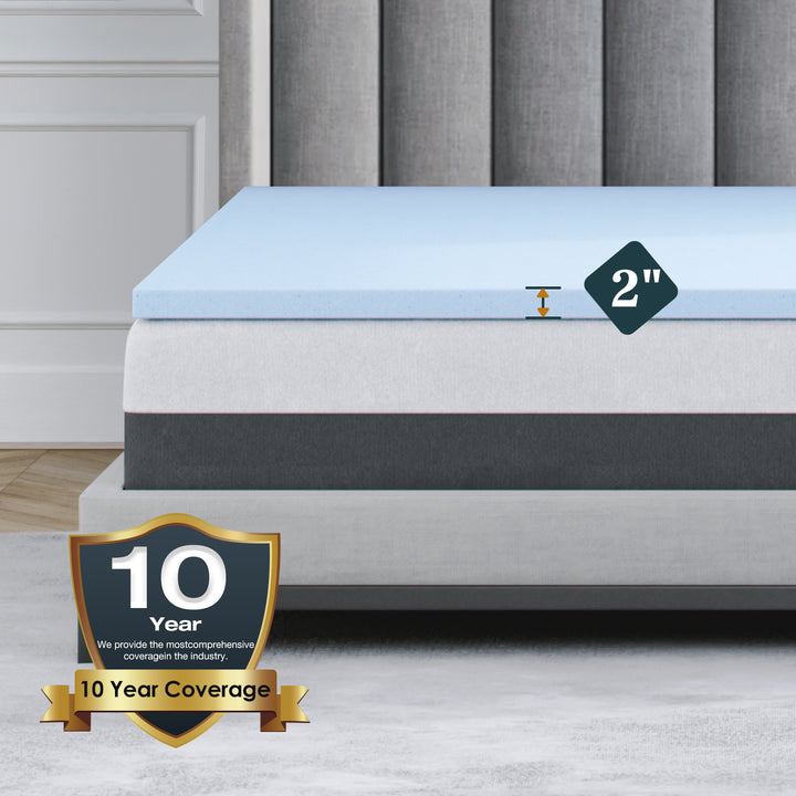 a mattress with a label with text: '2" 10 Year We provide the mostcomprehensive coveragein the industry. 10 Year Coverage'