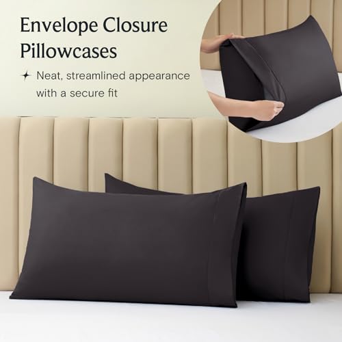 a group of black pillows on a bed with text: 'Envelope Closure Pillowcases Neat, streamlined appearance with a secure fit'