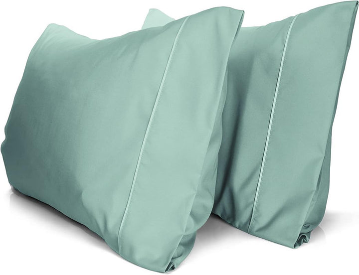 a pair of pillows on a white background