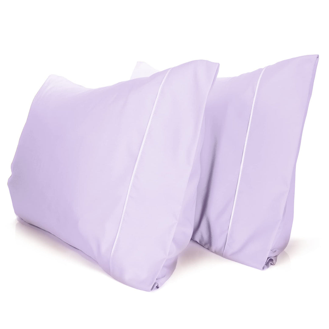 a pair of pillows on a white surface