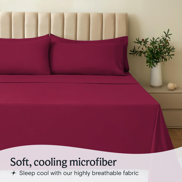 a bed with a red sheet and pillows with text: 'Soft, cooling microfiber Sleep cool with our highly breathable fabric'