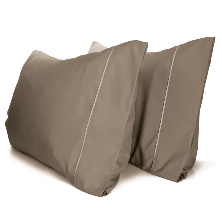 a pair of pillows on a white background