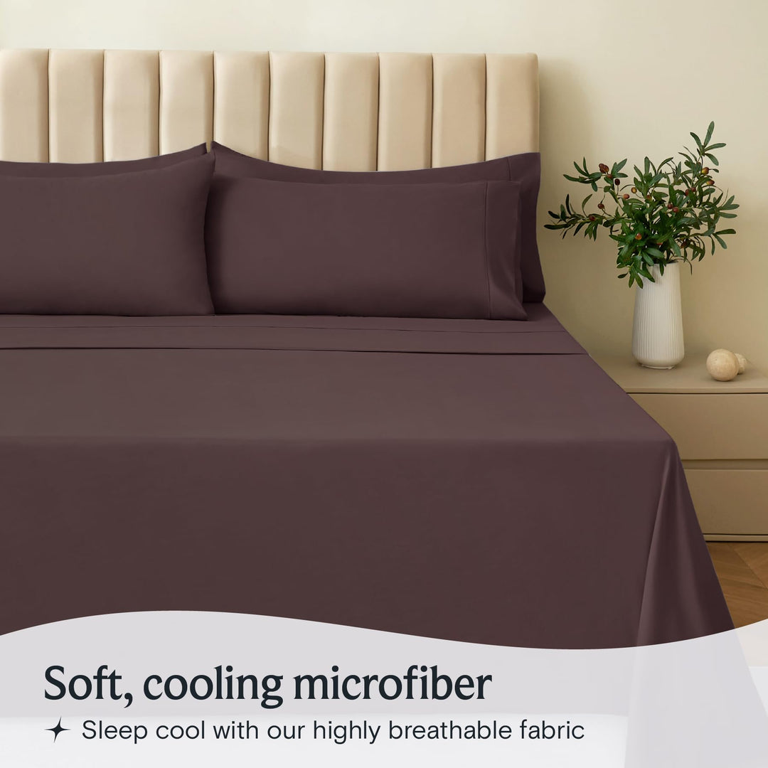 a bed with a vase of flowers with text: 'Soft, cooling microfiber Sleep cool with our highly breathable fabric'