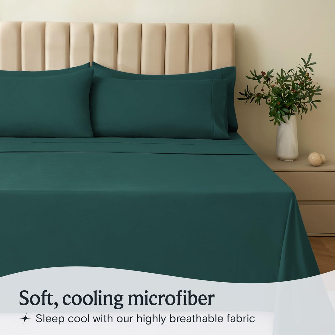 a bed with a green sheet and pillows with text: 'Soft, cooling microfiber Sleep cool with our highly breathable fabric'