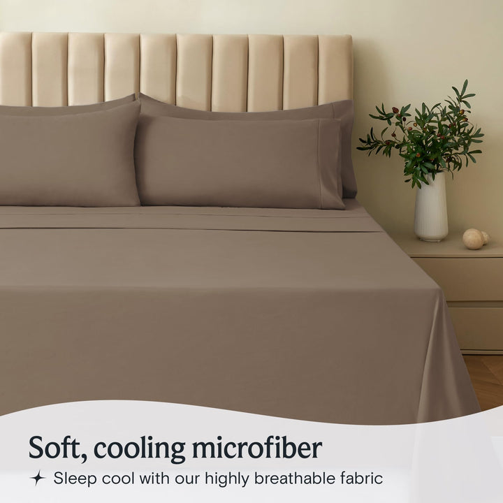 a bed with a vase of flowers with text: 'Soft, cooling microfiber Sleep cool with our highly breathable fabric'