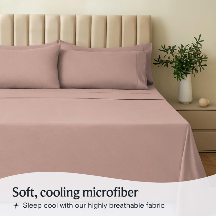 a bed with a vase of flowers with text: 'Soft, cooling microfiber Sleep cool with our highly breathable fabric'