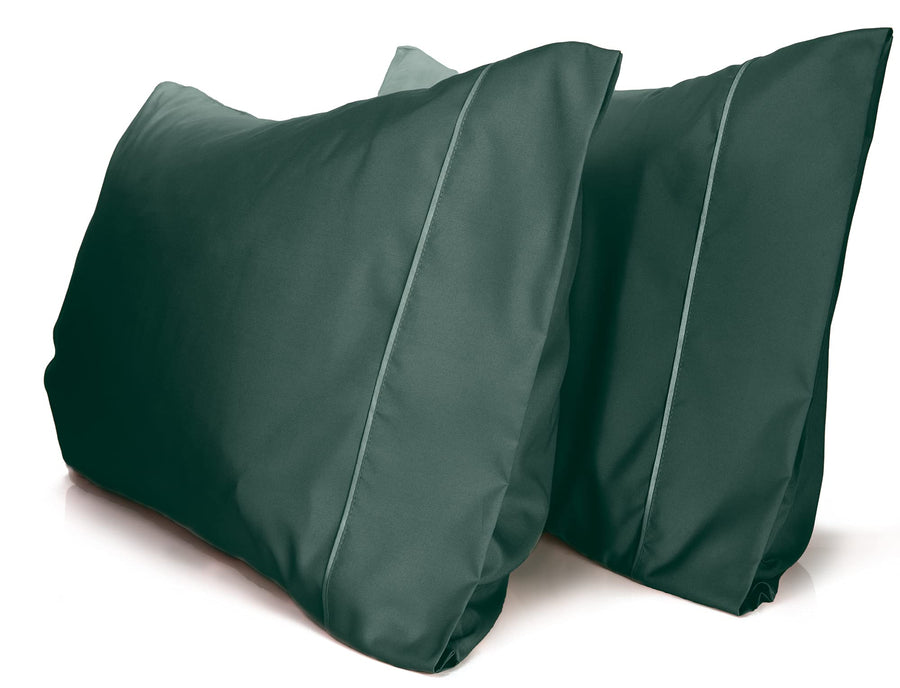 a pair of green pillows