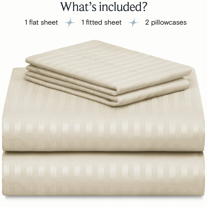 a stack of white sheets with text: 'What's included? 1 flat sheet 1 fitted sheet 2 pillowcases'