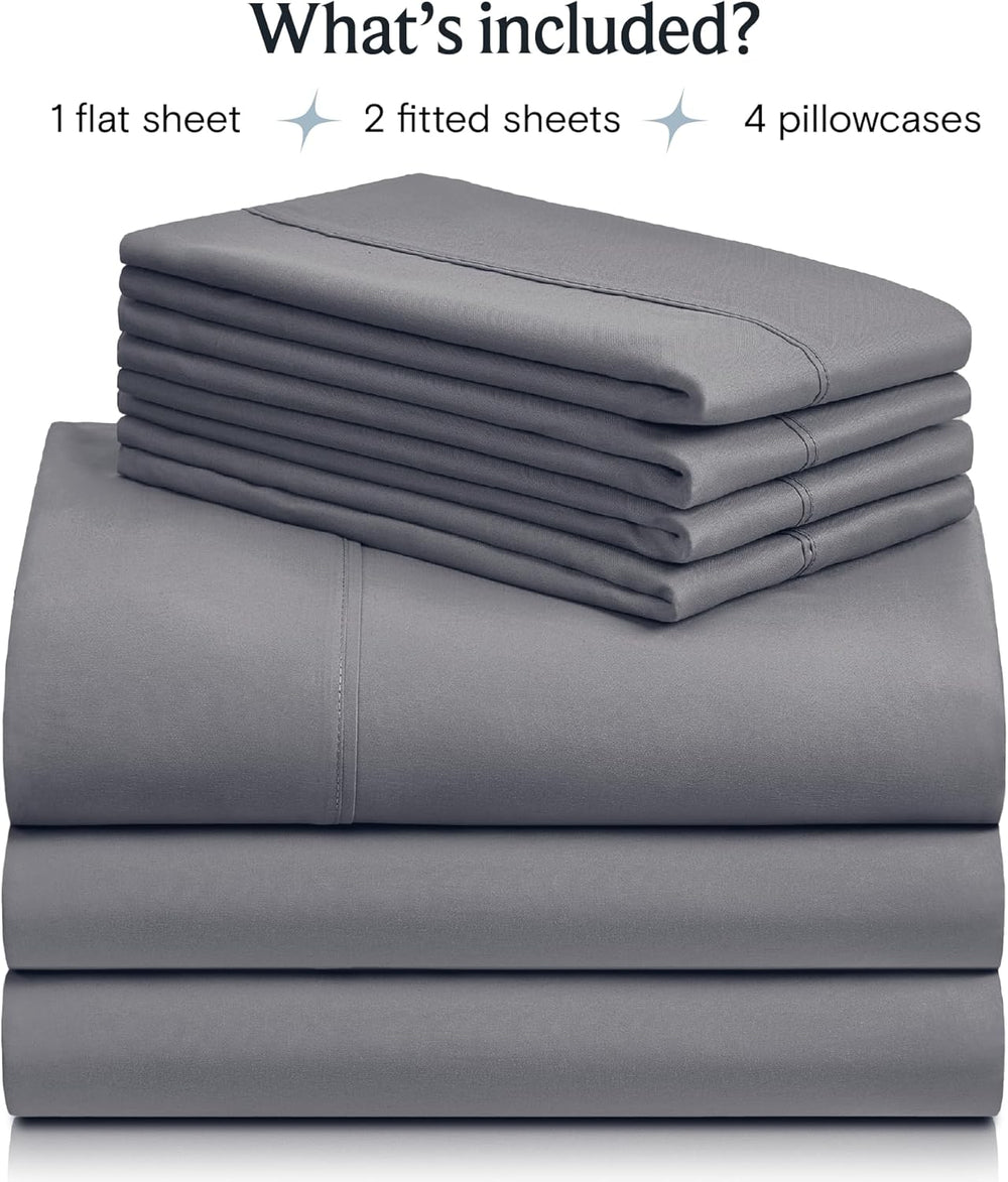 a stack of grey sheets with text: 'What's included? 1 flat sheet 2 fitted sheets 4 pillowcases'