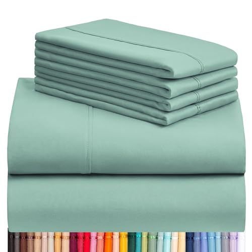 a stack of sheets and a pile of colorful sheets