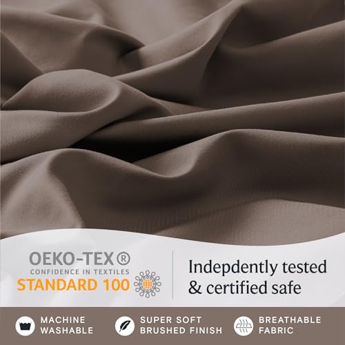 a close up of a fabric with text: 'OEKO-TEX Indepdently tested CONFIDENCE IN TEXTILES STANDARD 100 & certified safe MACHINE SUPER SOFT BREATHABLE WASHABLE BRUSHED FINISH FABRIC'