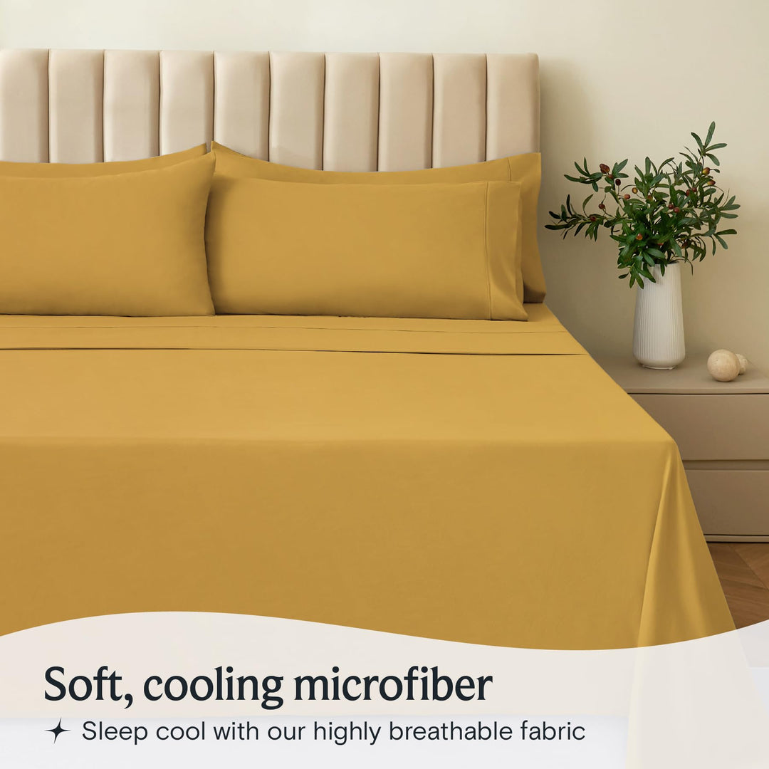 a bed with a plant in a vase with text: 'Soft, cooling microfiber Sleep cool with our highly breathable fabric'