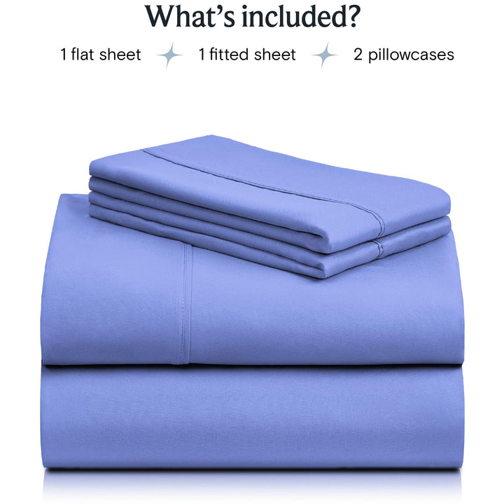 a stack of blue sheets with text: 'What's included? 1 flat sheet 1 fitted sheet 2 pillowcases'