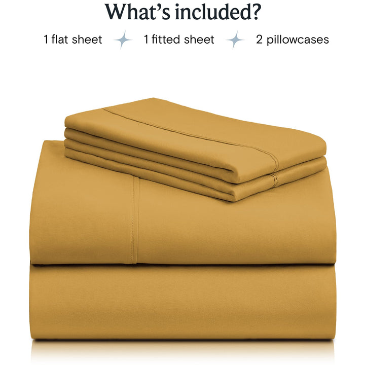 a stack of folded sheets with text: 'What's included? 1 flat sheet 1 fitted sheet 2 pillowcases'