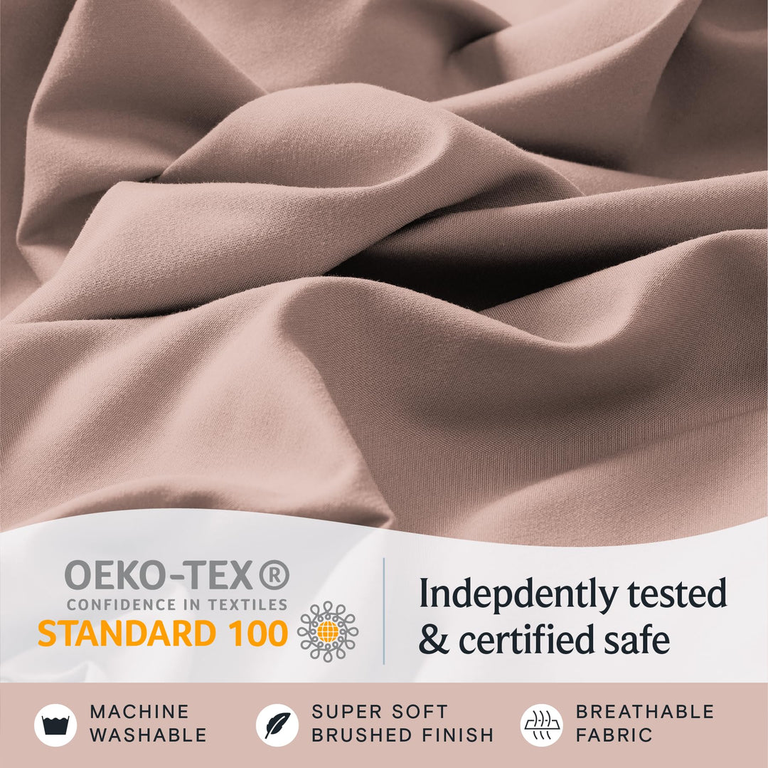 a close up of a fabric with text: 'OEKO-TEX Indepdently tested CONFIDENCE IN TEXTILES STANDARD 100 & certified safe MACHINE SUPER SOFT BREATHABLE WASHABLE BRUSHED FINISH FABRIC'