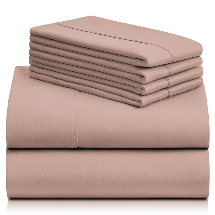 a stack of pink sheets